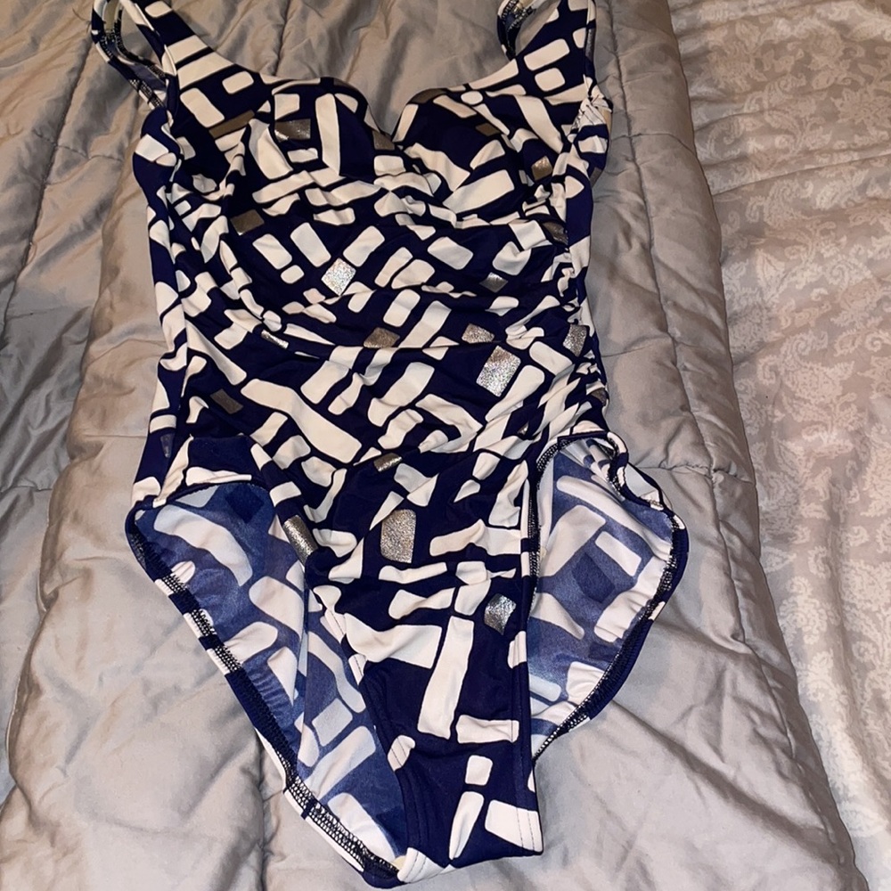 Pre owned miraclesuit one piece bathing suit size 14, waist cinching